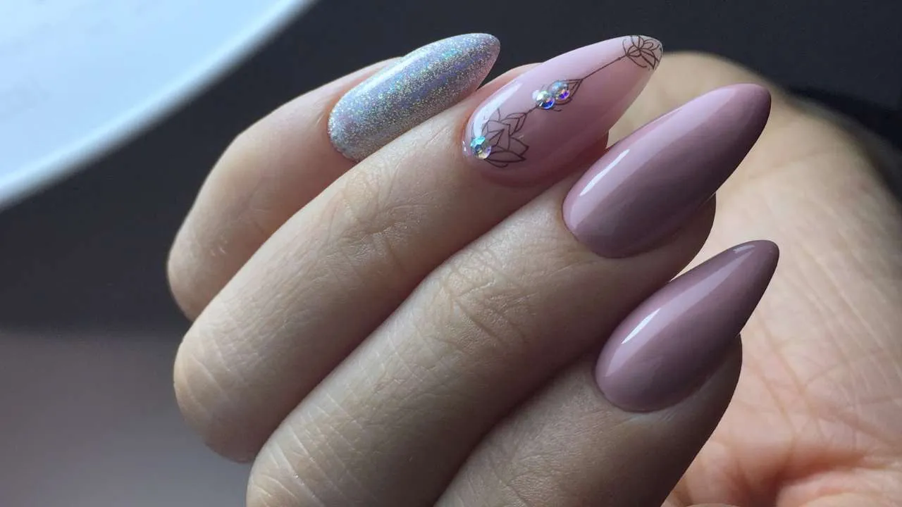 Close-up of mauve gel extensions.